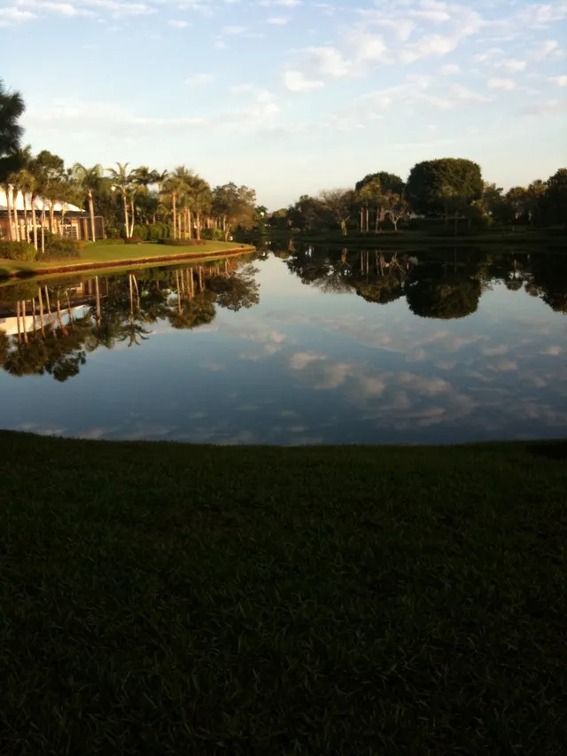 Beautiful lake with walking path located within steps from the condo.