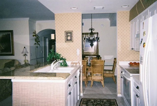 A view taken from the breakfast room to show the dining, living & hall area