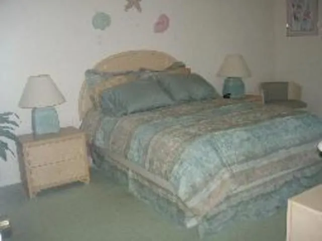 Spacious MBr has walk in closet, own bathroom, cable TV & opens onto lanai.