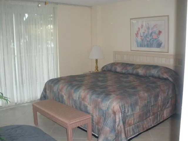 Master bedroom with king sized bed.