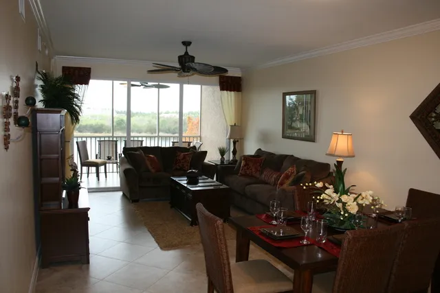 Professionally decorated 3 bedroom 2 bath plus a den condo on the 3rd floor overlooking lake & preserve