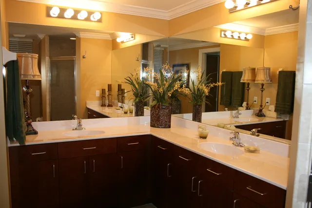 Master bath features dual sinks and a walk in shower - towels & linens included