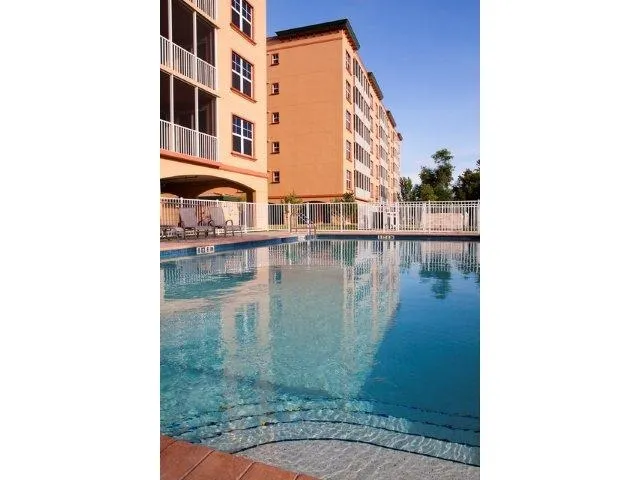 Resort pool! Condo features an elevator and garage parking
