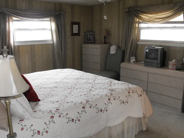 Master Bedroom King size bed ensuite bathroom and walk in clothes closet