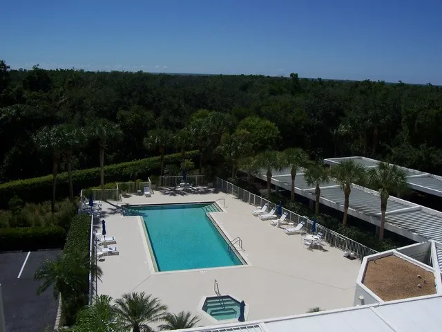LARGE POOL, SPA AND POOL DECK.