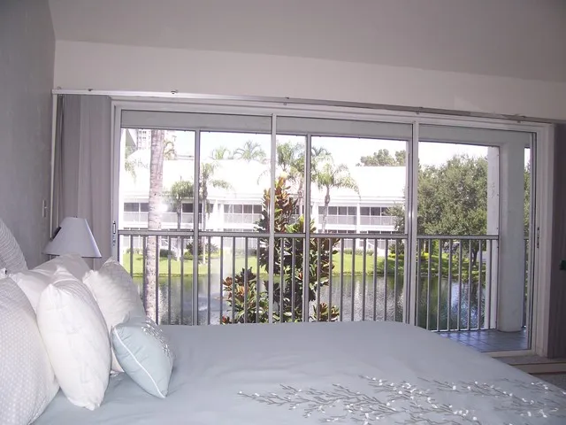 MASTER BEDROOM WITH LAKE VIEW
