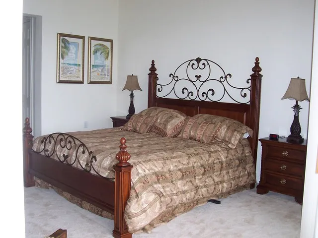 Master Bedroom Suite w/king-sized bed, private luxury bath & lake view.