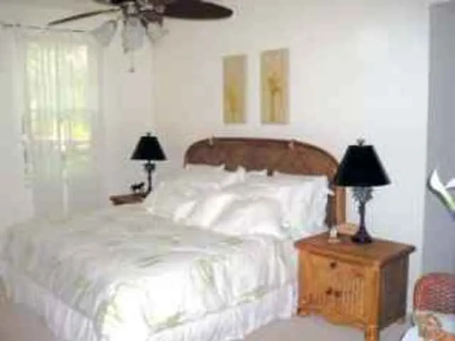 Bedroom furniture from Robb & Stucky. Armoire opposite with TV and DVD. 