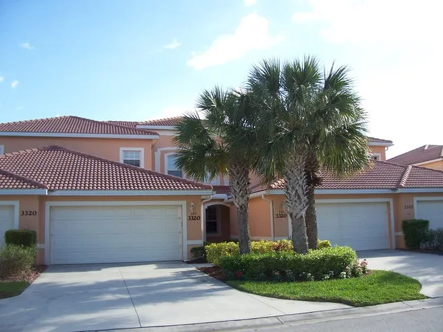 FRONT EXTERIOR WITH 2 CAR GARAGE WITH PLENTY OF PARKING