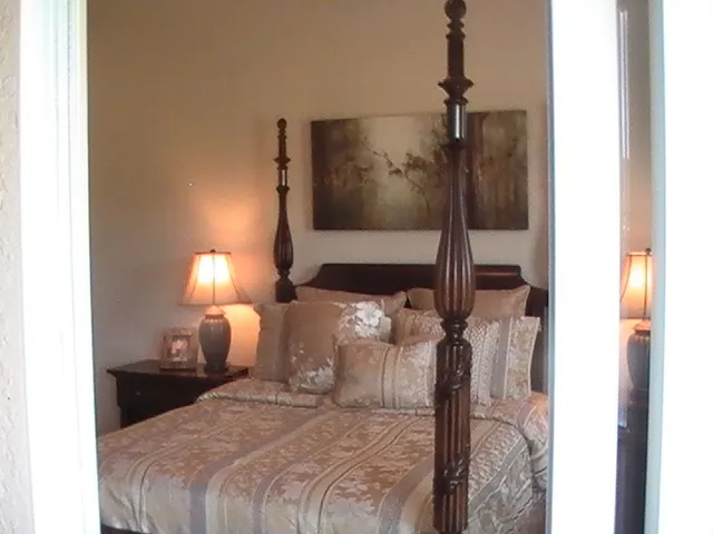 Master bedroom with 4 poster bed
Chest of draws set to match and TV