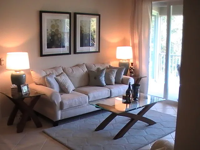 The Living room leading to the balcony with views of the 18th Hole Blue Tee