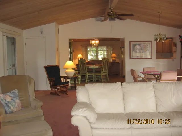 GREAT ROOM LOOKING TOWARDS DINING ROOM AND KITCHEN