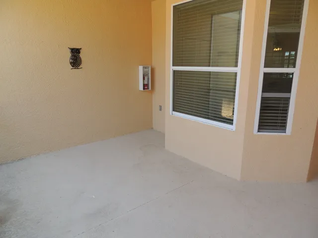 Front lanai has garden views and plenty of room for a table/chairs!