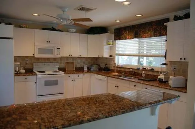 Open kitchen with breakfast bar