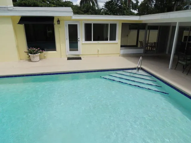 Crystal blue pool - lots of windows!! 