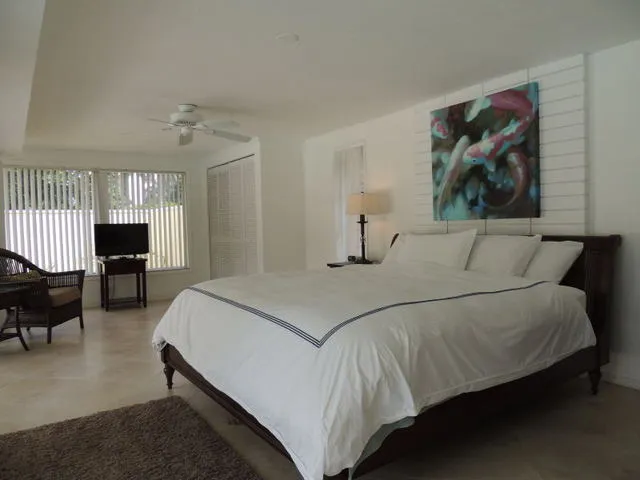 Master suite features king bed, private bath, 2 closets, flat screen tv