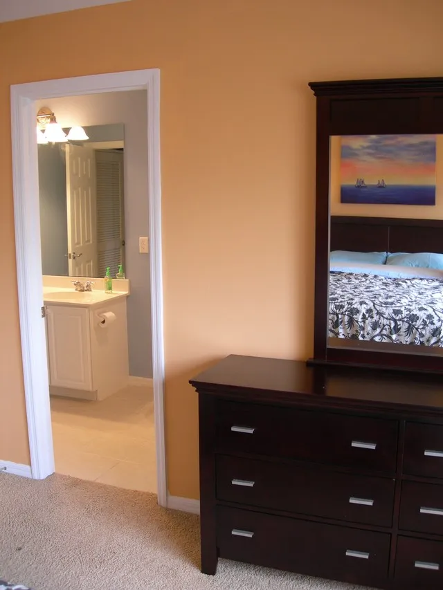 Second Bedroom with shared attached bath and flat screen TV