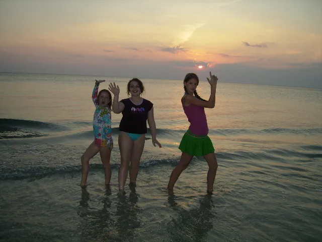 Our girls at sunset on Parkshore Beach