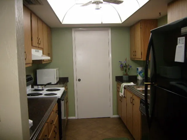 fully equipped kitchen with all full size appliances