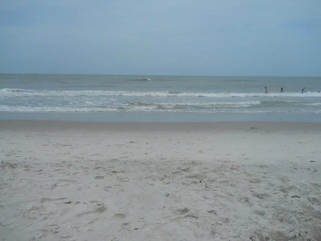 Beach less than 2 miles away.