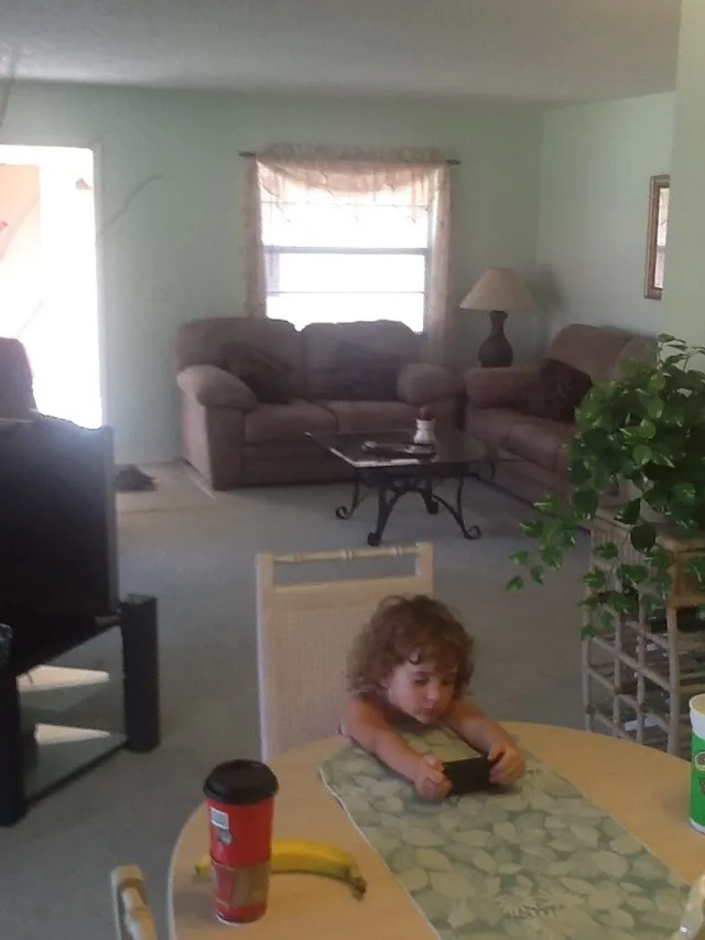 Living room and my little girl.
