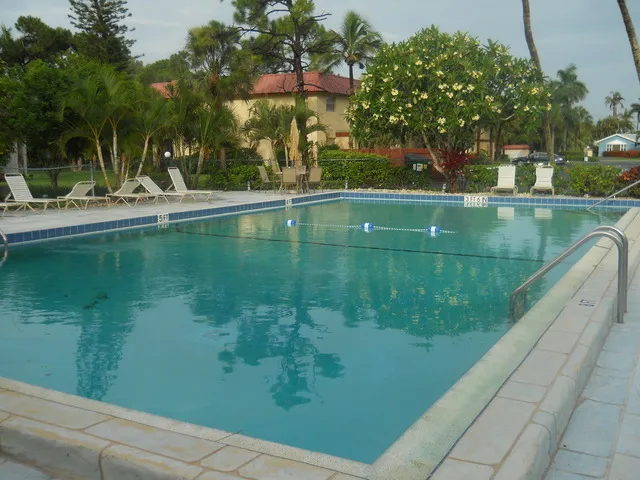 Pool and tennis court just steps from condo.