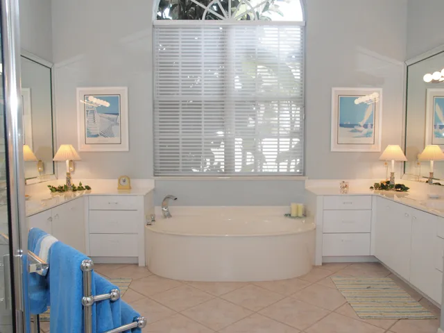 Master bath has double vanities, extra large shower and soaking tub.