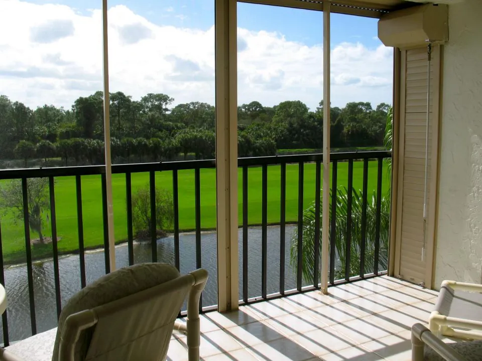 Imperial condo with fabulous golf course & lake view photo 1