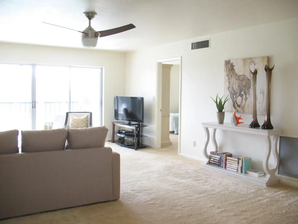 Living area with large flat screen TV