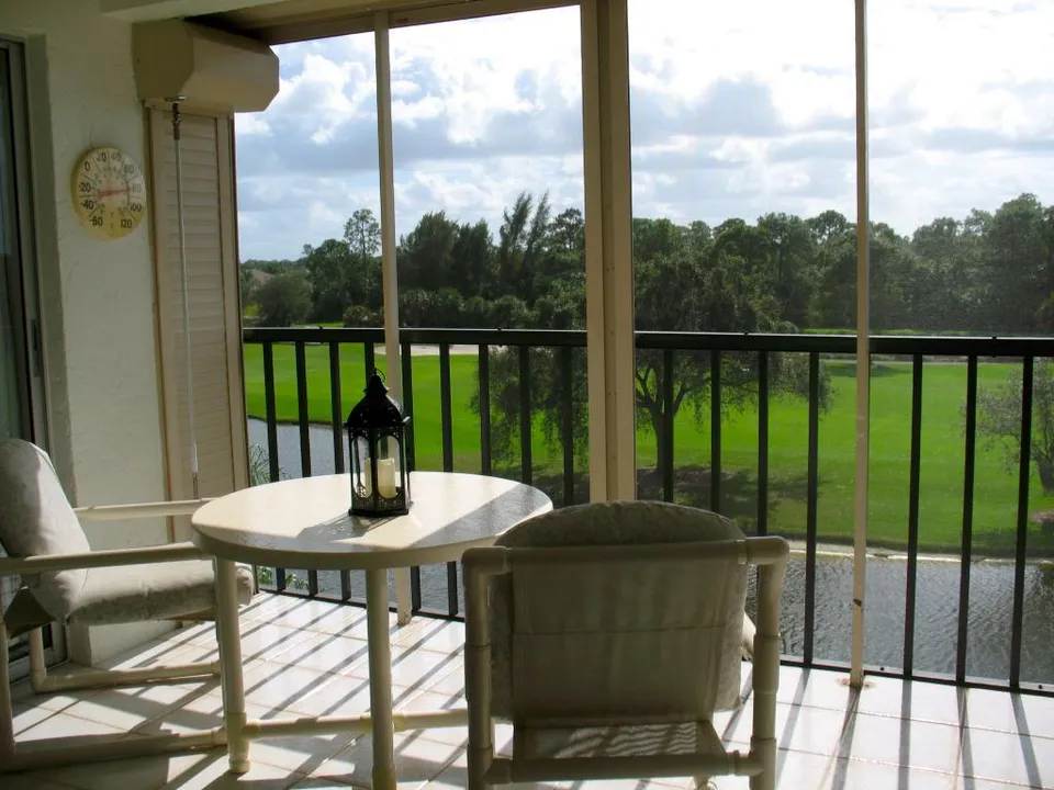 Lanai with golf and lake view