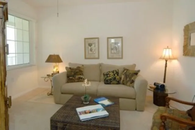 The den is the perfect place to read a book or catch a movie
