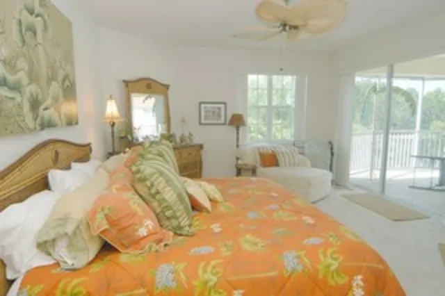 The master suite is spacious has has access to the lanai