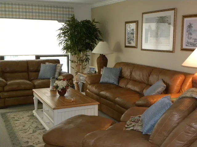 Living Room with New Leather Seating and Flat Screen TV
