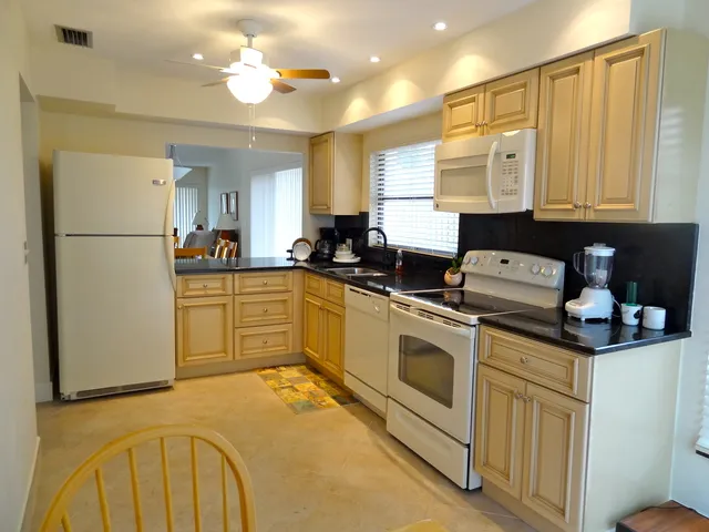 Newly remodeled kitchen with granite counters