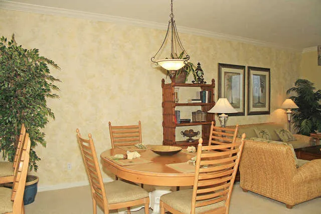 Dining Room Area - Large Dining Table on lanai so you can see the sunsets.