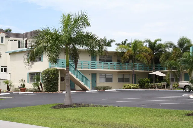 Unit #1 bottom left. Assigned parking and easy access. Light and bright end