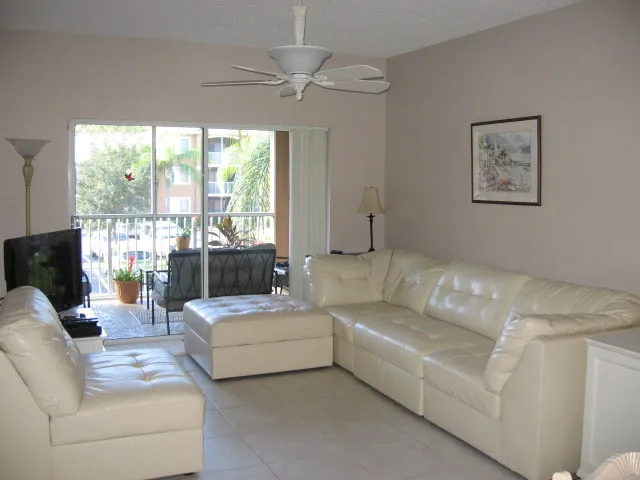 living room has leather sectional and 42" flat screen hdtv