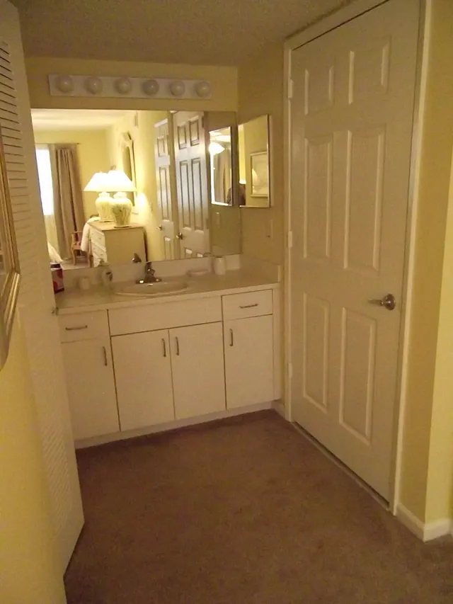 Extra vanity in the bedroom.
