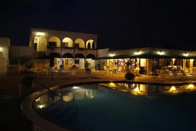 Clubhouse with the pool at night