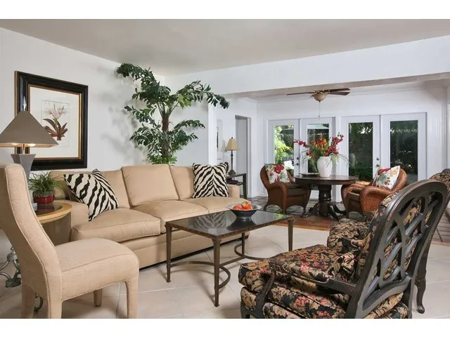 Open floor plan with French doors opening to deck