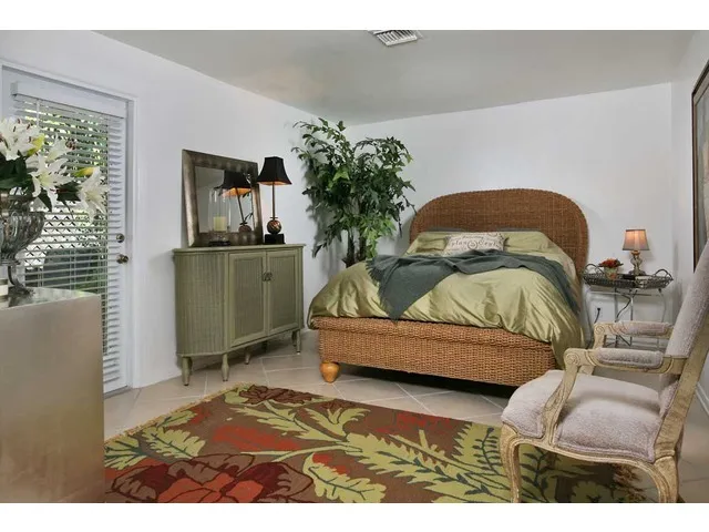 Master Bdrm with outside entrance to private patio area