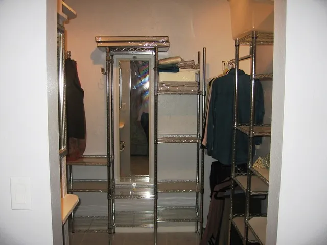 Master closet with mirror medicine cabinet, vanity shelf& electric (at left