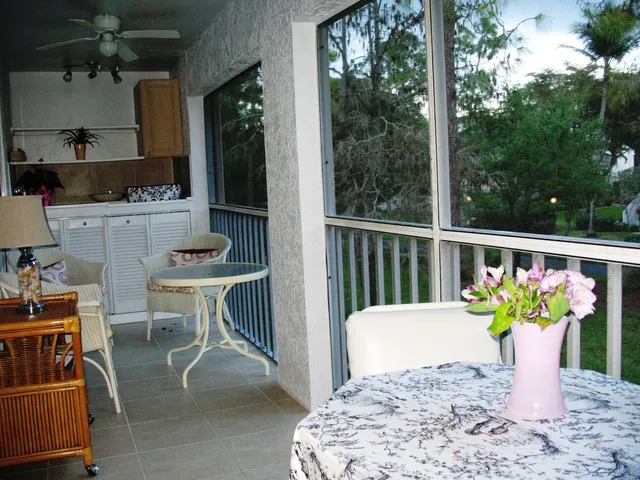East facing tiled lanai overlooks gardens and the lake.  