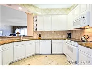 Large kitchen with granite counter tops and fully equipped - washer & dryer in the unit as well