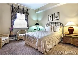 Guest suite 1 has a queen bed w/ private seating area, tv, private bath
