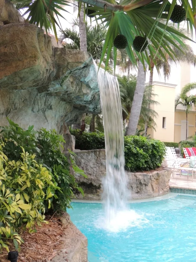 Amenities include 2 pools, spas, fitness room, outdoor kitchens, boat docks