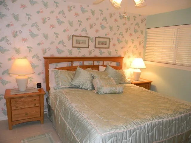 Master bedroom with a king-sized bed.