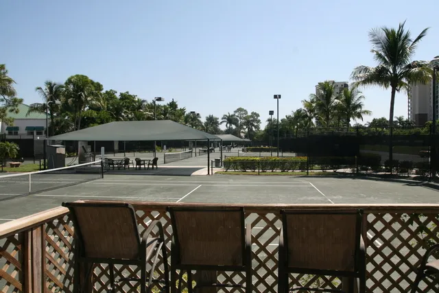 6 hardtrue tennis courts next door to Villa part of the Tarpon Cove Club