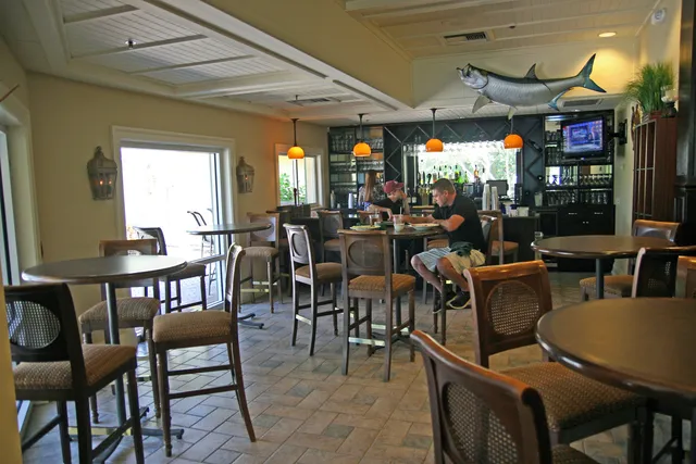 Indoor bar area at club next to pool...