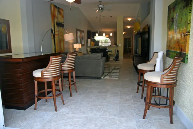 New Tommy Bahama bar area next to entrance to funished lanai and grill